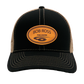 Custom Engraved Leather Disc Golf Hat - PDGA Player Badge - Black & tan trucker cap