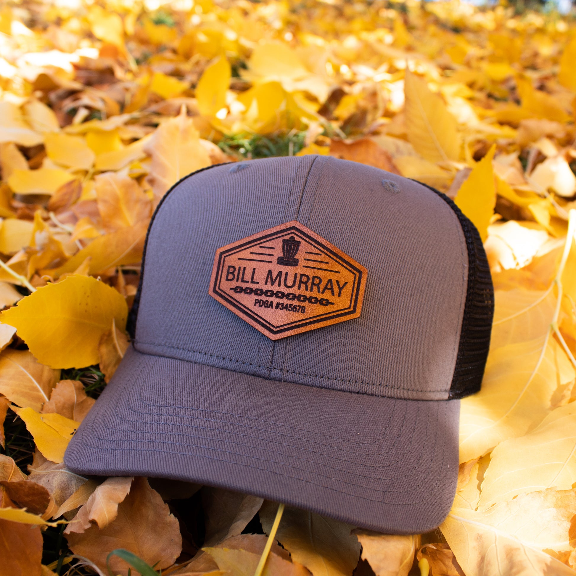 Custom Leather Disc Golf Ball Cap - PDGA Player Badge - Gray & Black Trucker Hat